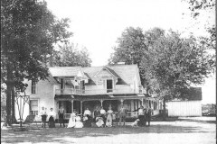 Tinsley House with family in foreground
