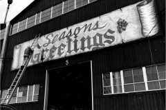 Merry Christmas sign on Oil Well Supply building