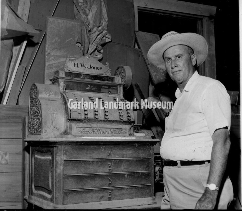 Donald Day Jones with H.W. Jones Hardware cash register