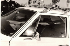 Policeman with new car