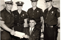 Police Chief presenting commendations
