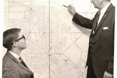 Police chief with student and  street map