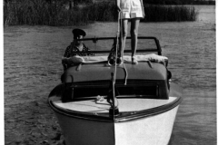 Motor boat with John Henry Williams, Bonnie Williams at White Rock Lake