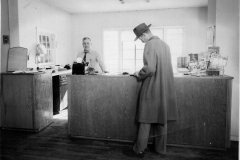 Hap Manzer & saleman at Mule Barn lumber yard, 1947