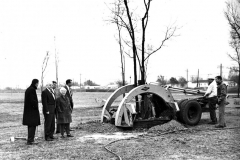 Photograph, Garland Daily News, Instant Parks Tree Planter Photograph, Garland Daily News, "Instant Parks" tree planter and two Parks Department employees. At left, Cecil Winters, Rufus Rupard, G. W. Range, ?, and Mrs. D. L. Yarborough, Jr., Park Board Chairman.