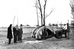 Photograph, Garland Daily News, Instant Parks Tree Planter Photograph, Garland Daily News, "Instant Parks" tree planter and two Parks Department employees. At left, Cecil Winters, Rufus Rupard, G. W. Range, ?, and Mrs. D. L. Yarborough, Jr., Park Board Chairman.