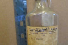 McKnight Drugstore Oil Cedar Bottle