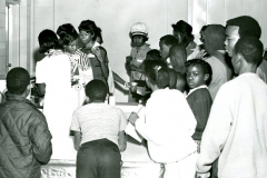 A group of people attending Lou Huff's reopening on February 2, 1969.