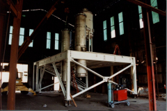 IMCO 1998.  Mezanine, solid rocket fuel recycling system. Intercontinental MFG. CO., INC.  Steve Johnson on the left with unidentified man on the right at the Garland Civic Theatre