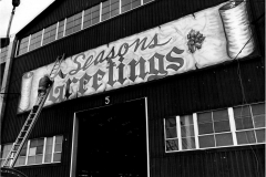 Merry Christmas sign on Oil Well Supply building