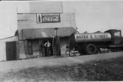 Centerville Grocery with Bates & Street Gasoline truck making delivery