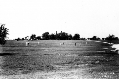 Golfers on Kingsley home lawn