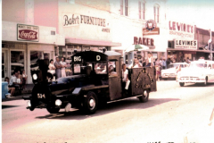 This photo of the 1960 Jaycee Labor Day Parade shows the south side of the square on Garland Avenue (now Main Street).
