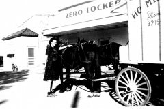 Zero Locker Co., on 5th St. between present Main & State.  Ann (Mrs. Geo.) Roland pictured with mule team.