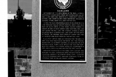 Historic marker on Square at 6th St., ca 1980s