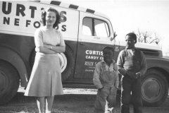 Virginia Ann Brand (Stone) in front of dad's truck, Roscoe Brand the Candy Man