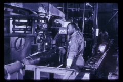MK82 unguided, general-purpose bomb lug cut out torch - Unidentified worker at the controls