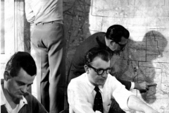 Norman MacDonald (seated), director of short range operations