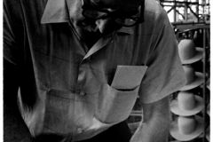 Photo of Ernest Russell finishing a hat at Byer-Rolnick Hat Corp 1966