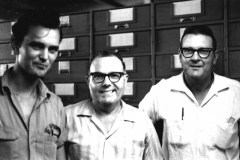 William C. Cook (center) with two unidentified men.