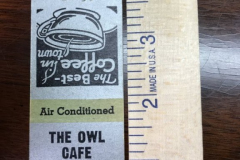 Matchbook cover from the Owl Cafe 'The Home of Good Food', run by N.P. Morrison. The cafe had air conditioning and was located on Main Street. The back reads, 'You have dined at the Owl Cafe in Garland, Texas, the town of low taxes, the home of municipally owned utilities, RESISTOL Hats, and the Southern Air Port Corporation, Population 2600. 1941. Good Luck and Please Call Again - THANKS.'