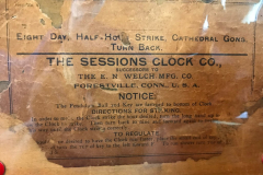 Sessions Mantle Clock Mantle Clock, Garland Post Office d.1924  While WM. J. Williams was a clerk at the Garland Post Office, this clock, made by The Sessions Clock Company based in Connecticut, was found during remodeling. Williams felt a special connection to the clock, since both his grandmother, Nora Seawright Lemmon, and aunt, Grace Lemmon Hartman, were postmasters in the 1910s. Female postmasters have been a common occurrence since the days when the American colonies were still a part of England. In the aftermath of the Civil War, the number of female postmasters in the South rose when men who had pledged allegiance to the Confederacy could not take the oath to become postmaster. The clock has pencil markings, such as SP and C, which would have been used in retail at the time to signify cost.  Although the Williams family believed the clock may have been acquired by Nora Seawright Lemmon, writing on the back which reads ‘SP 10-5-24 C’ indicates the post office acquired the clock in 1924, when Curtis D. Crossman was postmaster.