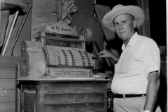 Donald Day Jones with H.W. Jones Hardware cash register