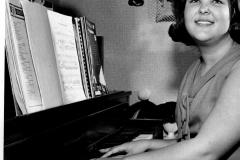 Peggy Brantley (Portillo) at the piano circa 1965