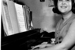 Peggy Brantley (Portillo) at the piano circa 1965