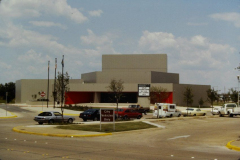 Garland Performing Arts Center front with vehicles parked along the street