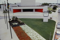 View of Garland Performing Arts Center entrance with full view of color bed