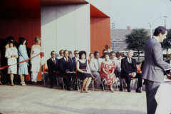 Unknown Man speaking in front of Garland Performing Arts Center  Ariel view of Garland Performing Arts Center