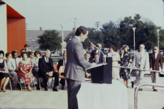 Unknown Man speaking in front of Garland Performing Arts Center