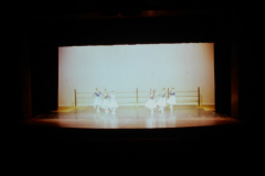 Six women dancing on stage in Performing Arts Center