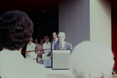 Unknown Man speaking in front of Garland Performing Arts Center