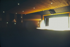Stage lit up by stage lights in auditorium in Garland Performing Arts Center