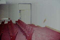 Back rows and entrance/exit in small auditorium in Garland Performing Arts Center