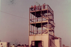 Emergency Corps members loiter around drill tower