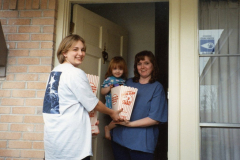 Soroptimist Galaxy Counseling Center - Delivering popcorn to a woman and child