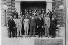 Men at entrance of First Christian Church erected 1922