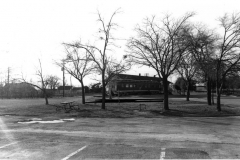 Lyles House renovation 1979 - new location before move. Train station and railcar.