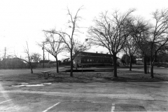 Lyles House renovation 1979 - new location before move. Train station and railcar.