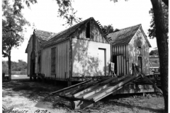 Lyles House renovation 1979 - new location before move. Train station and railcar.