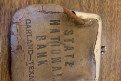 Larger brown State National Bank coin purse.