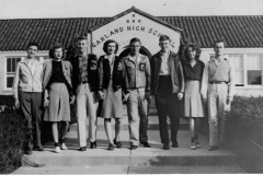 Garland High School students with the school in the background