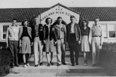 Garland High School students with the school in the background