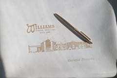 Williams Funeral Home pouch with pen