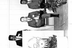 A group of people attending Lou Huff's reopening open house on February 2, 1969.