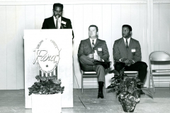A group of people attending Lou Huff's reopening open house on February 2, 1969.