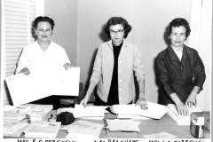 Juanita Ferguson (Mrs. R. O.), Mrs. Ray Shape, Mrs. L. O. Sorrells.  Collating papers for a project in 1960.